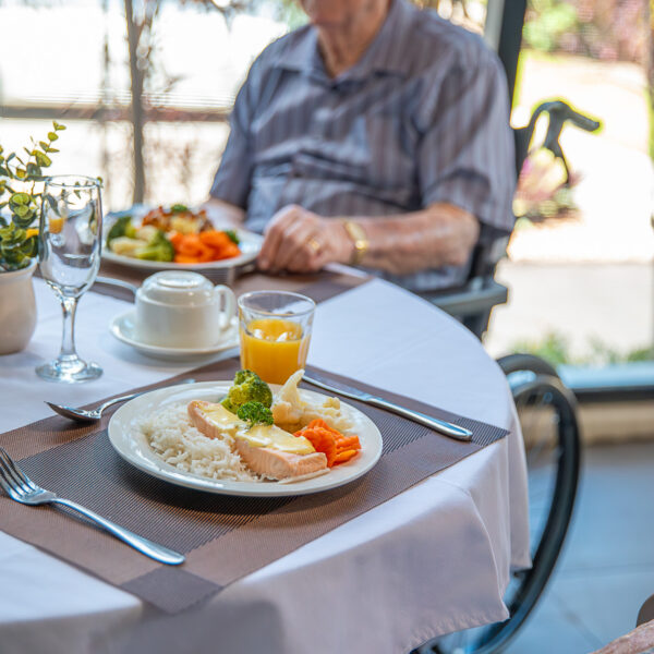 Mercy Place Cairns lunch of salmon, rice and vegetables